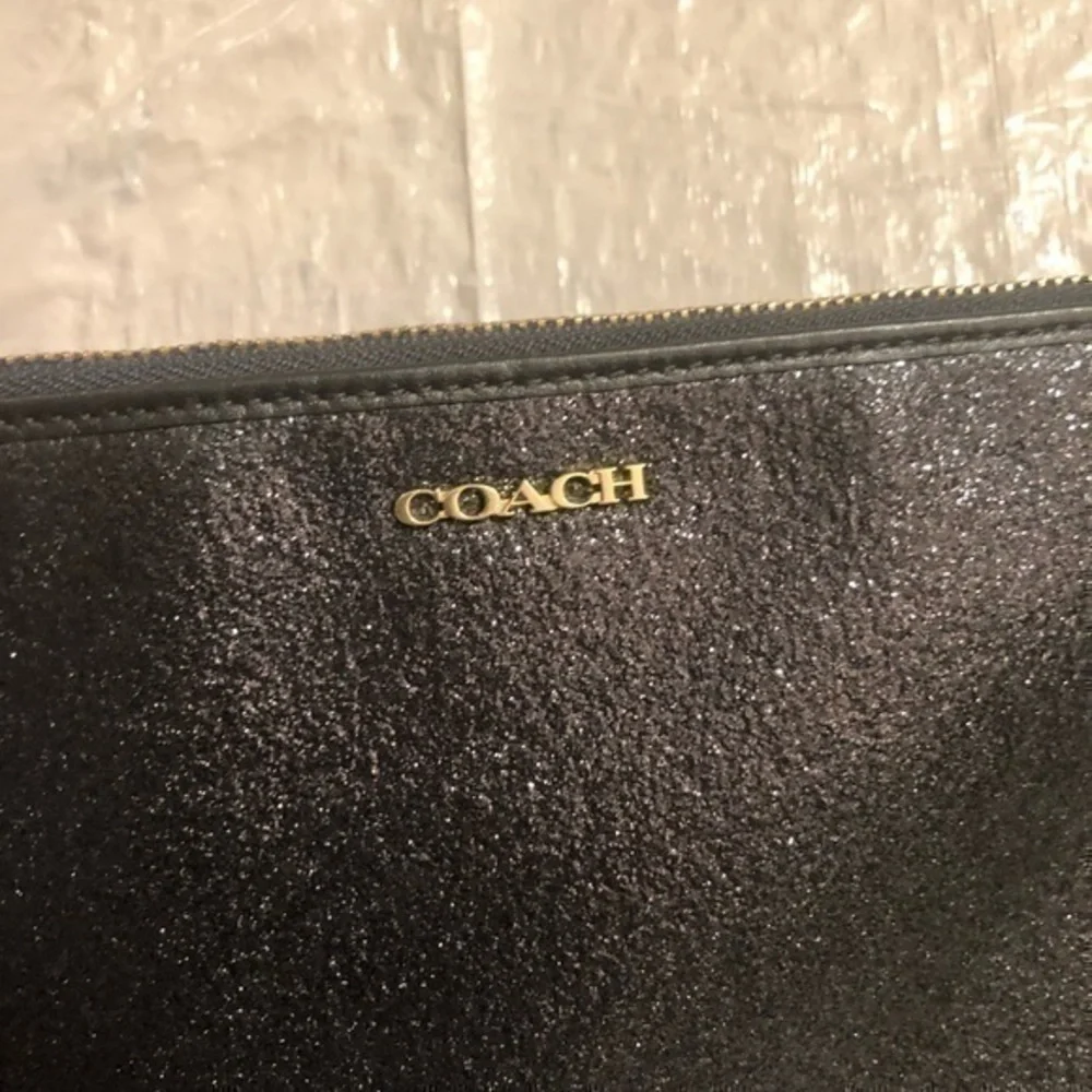 Coach black shimmer cosmetic bag case